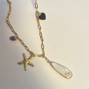 Gold and Purple Necklace with Elegant Design